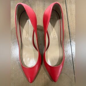 BCBG Max Azria red leather pointed-toe classic pumps made in Italy.